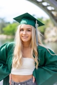 woman in green academic gown