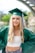 woman in green academic gown