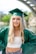 woman in green academic gown