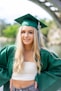 woman in green academic gown