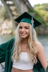 woman in green academic gown