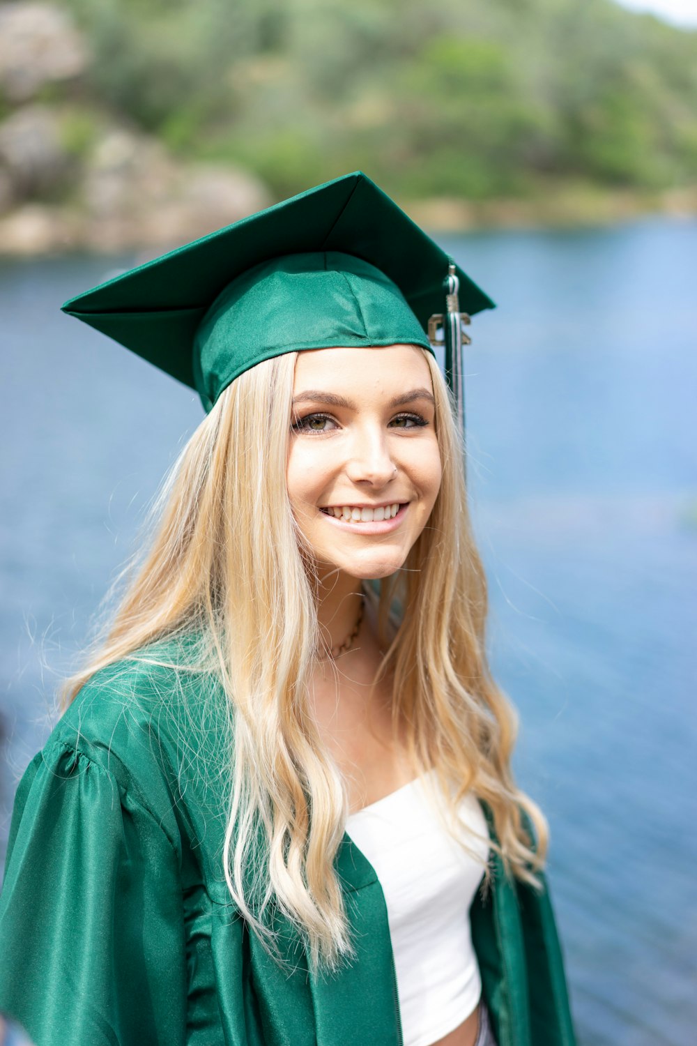 woman in green academic gown