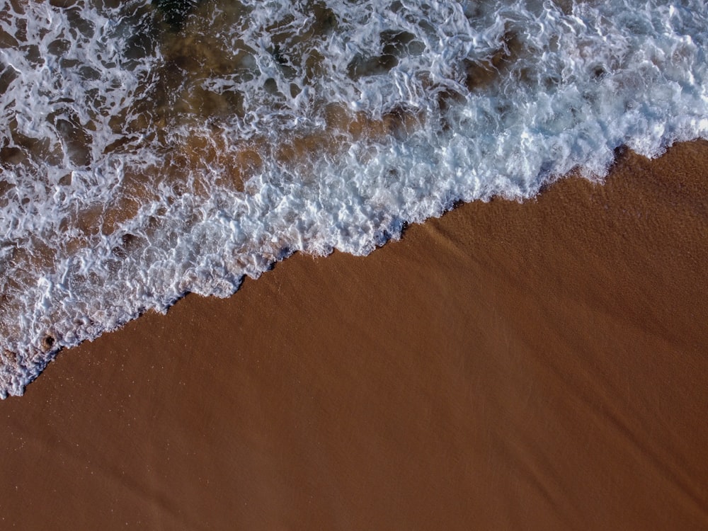 white and blue ocean waves