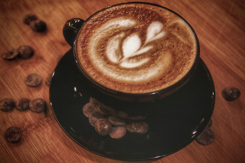 black ceramic mug with coffee