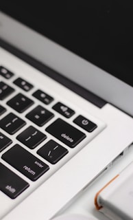 black and silver laptop computer