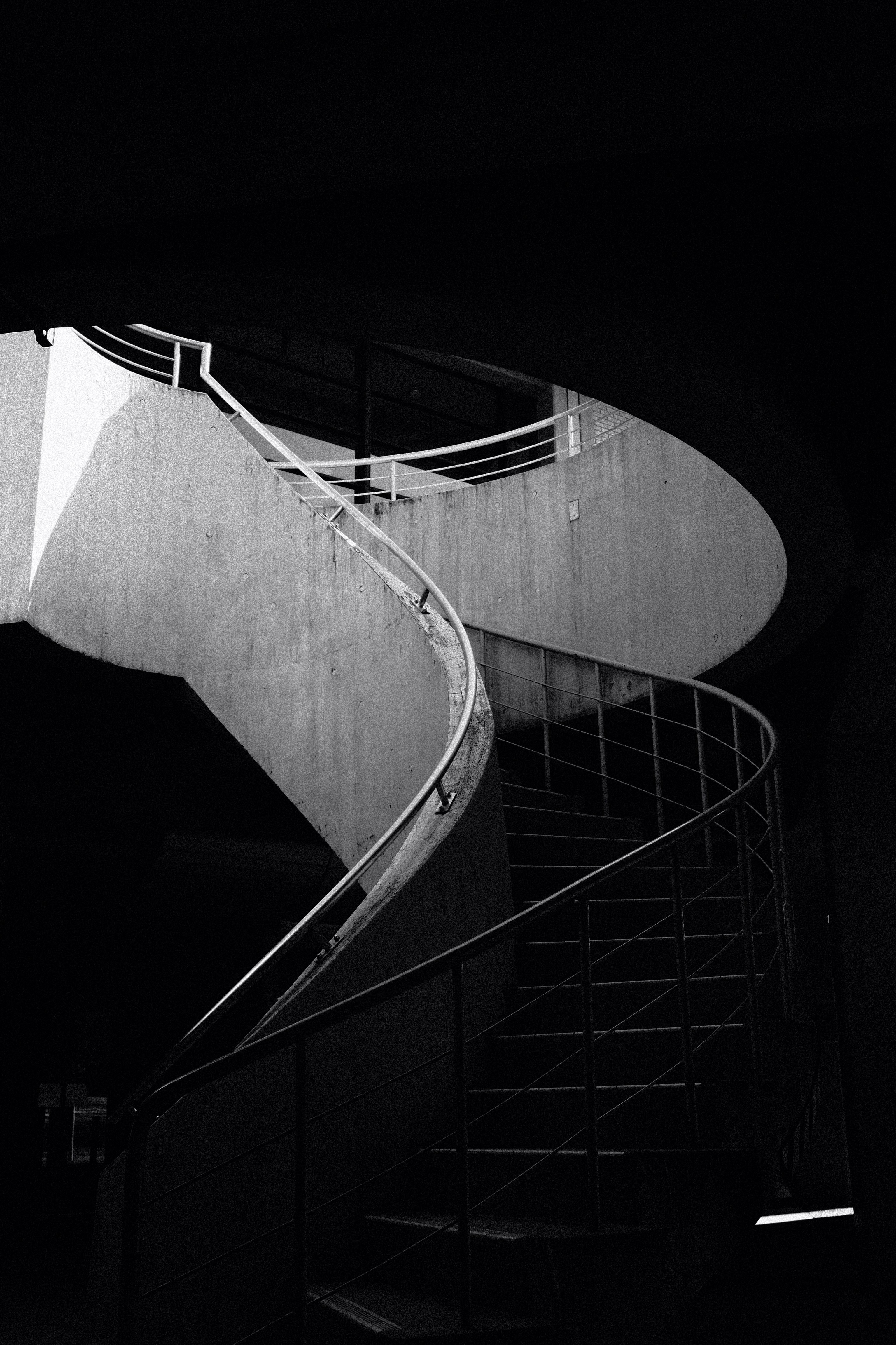 Black and white spiral staircase photo Free Grey Image on Unsplash