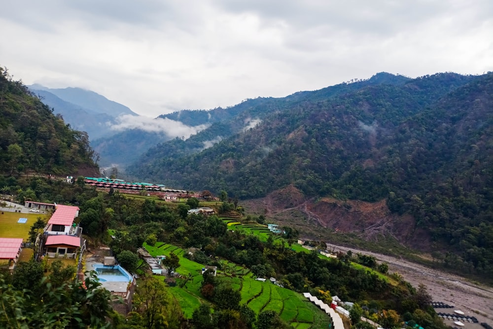 green mountains under white cloudy sky during daytime