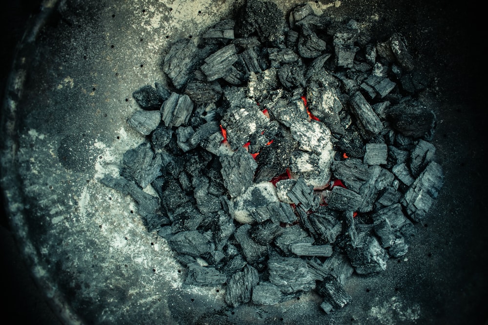 black stones on gray sand