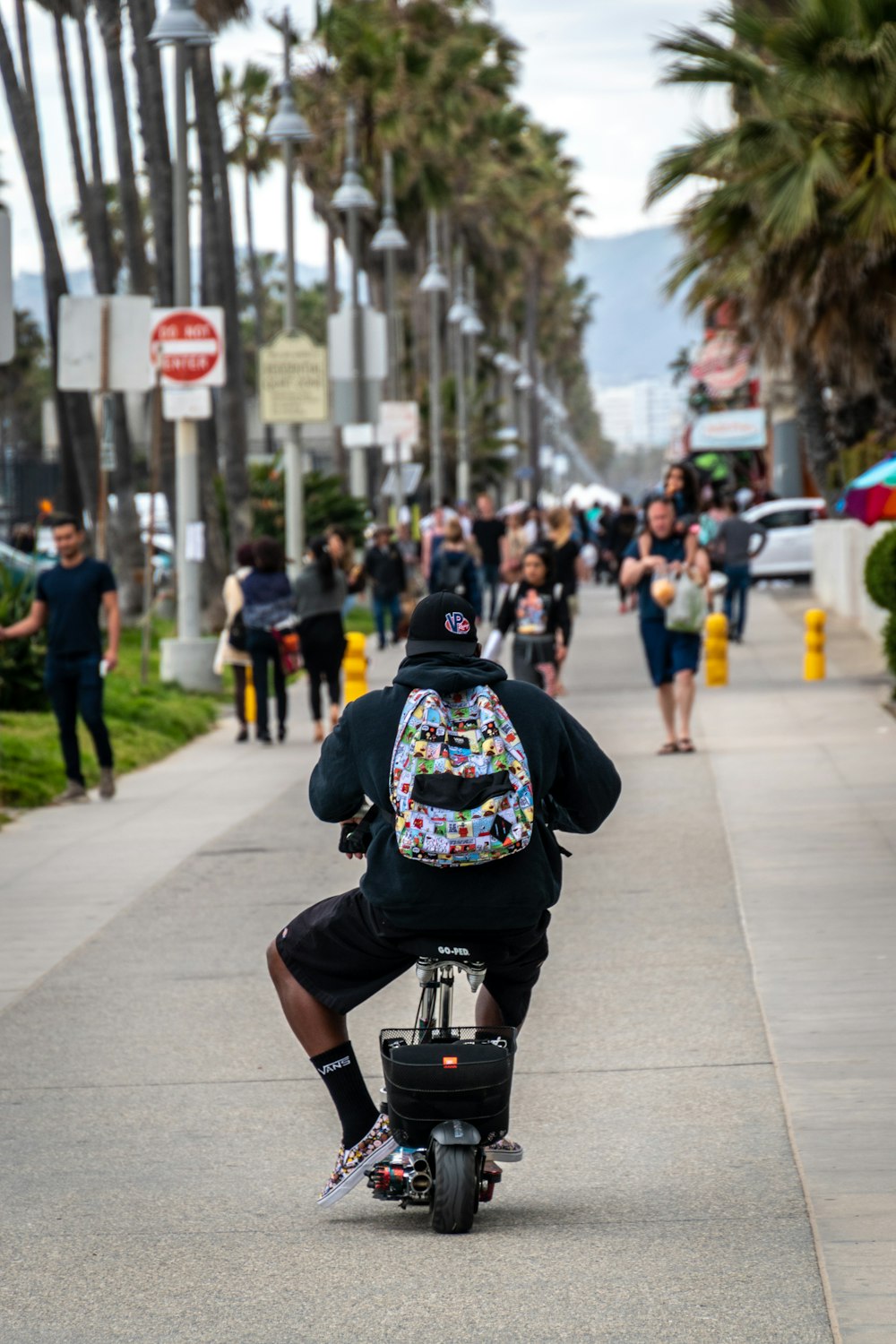 people walking on sidewalk during daytime