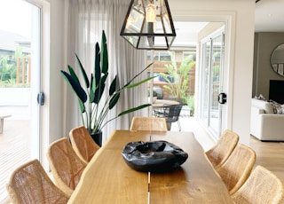 black round plate on brown wooden table