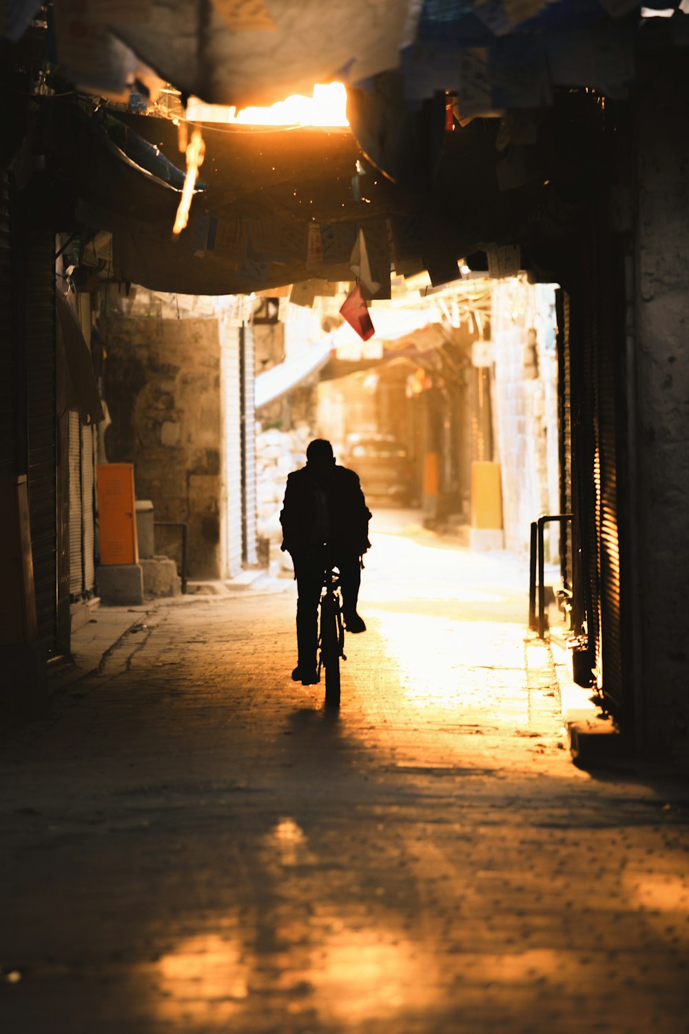 silhouette of person walking on hallway