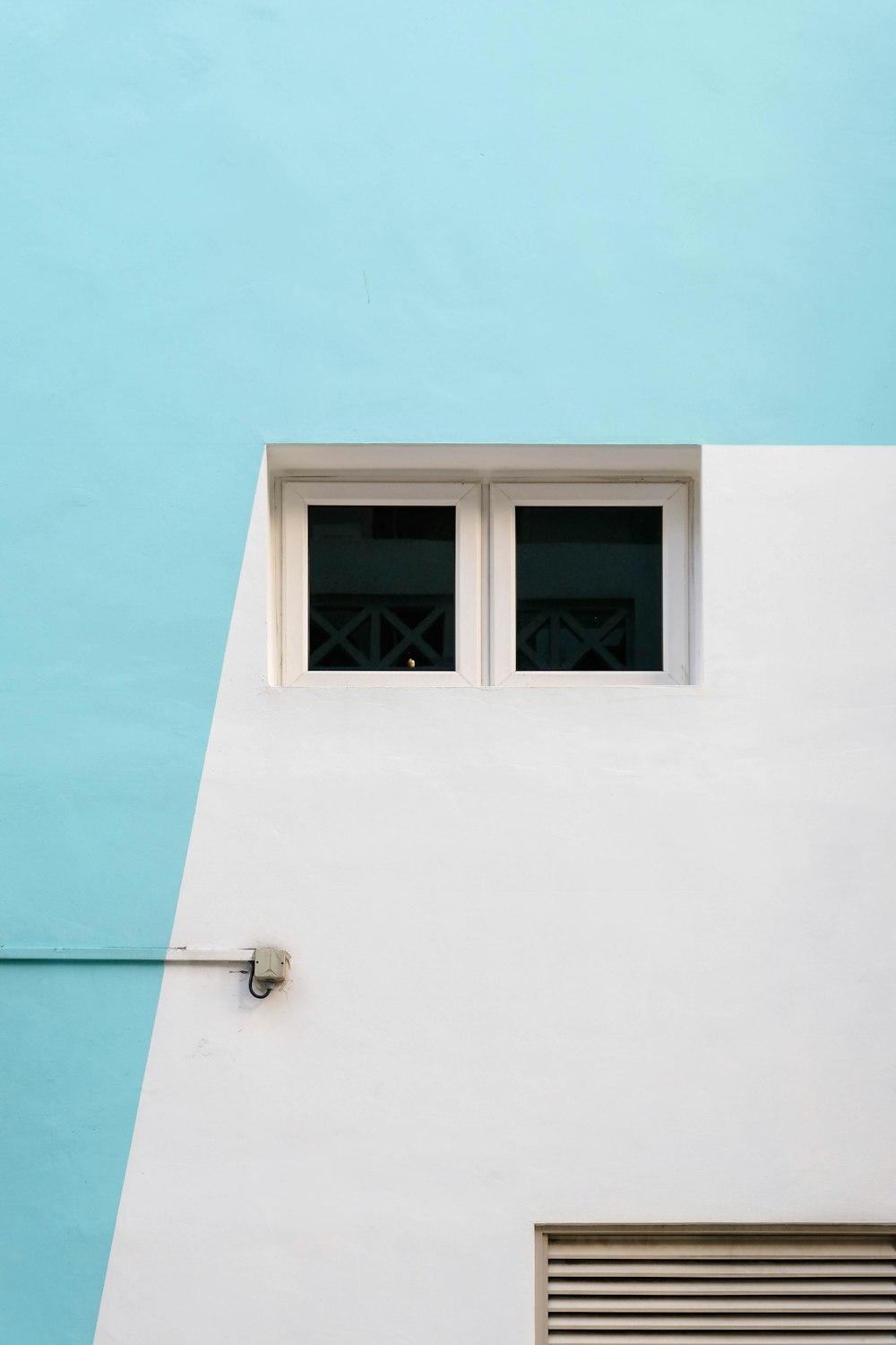 white wooden framed glass window