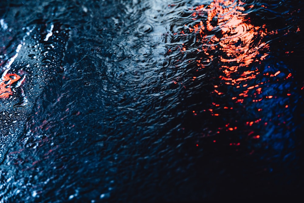water droplets on black surface