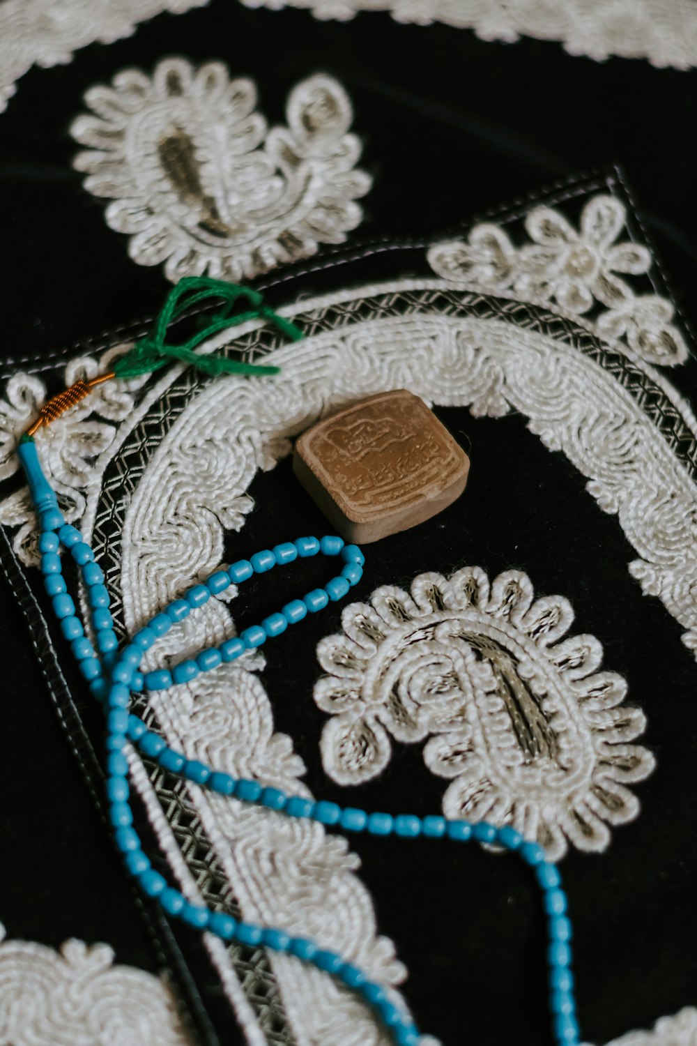 white blue and brown beaded necklace