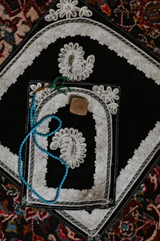 black white and red floral area rug