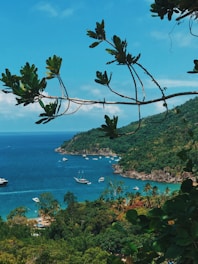 white boat on blue sea during daytime