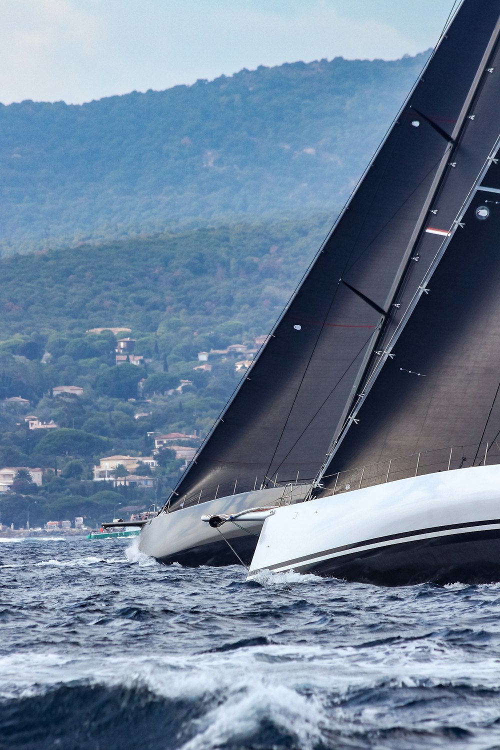 white sailboat on sea during daytime