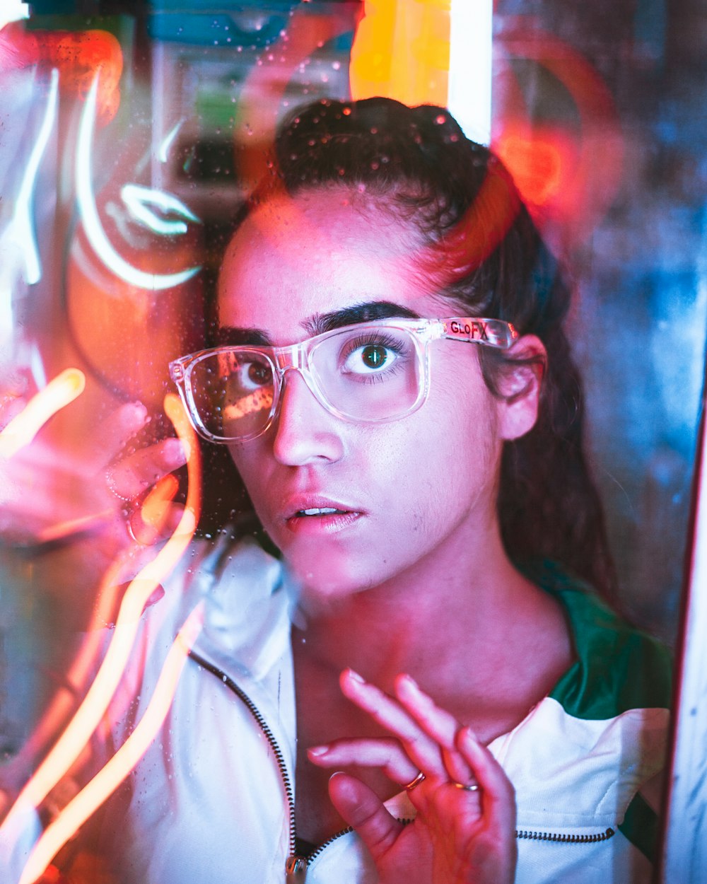 woman in white shirt wearing eyeglasses