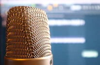 Close-up of a microphone surrounded by glowing AI data streams.