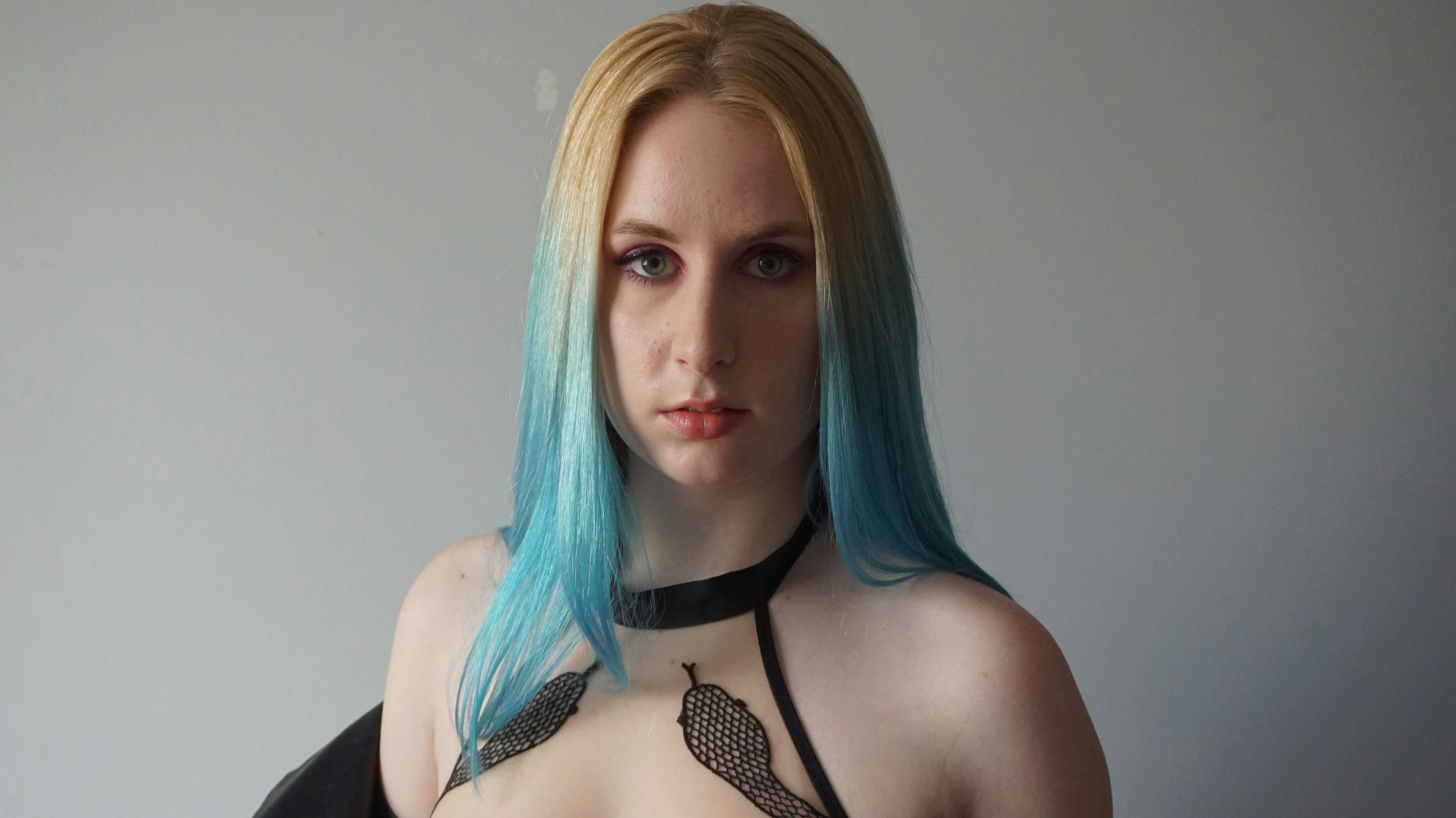 woman in black and white polka dot brassiere