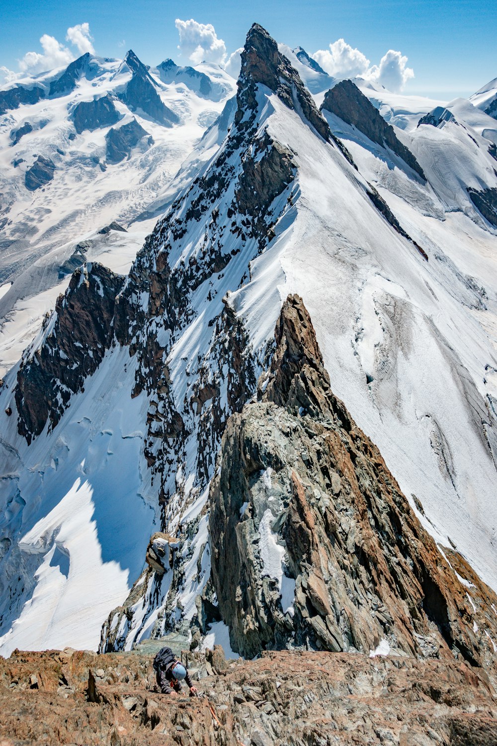 snow covered mountain during daytime