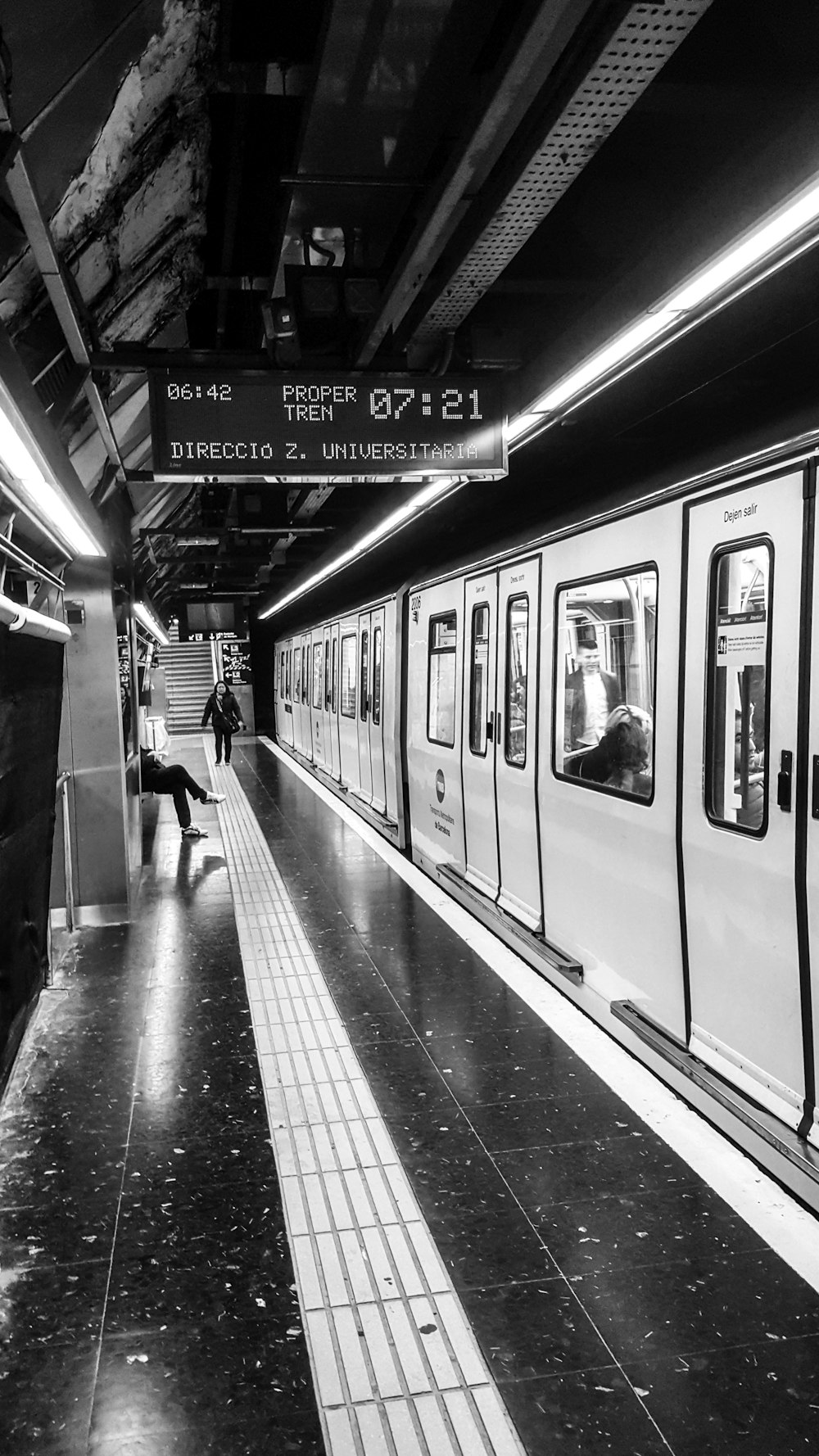 grayscale photo of train station