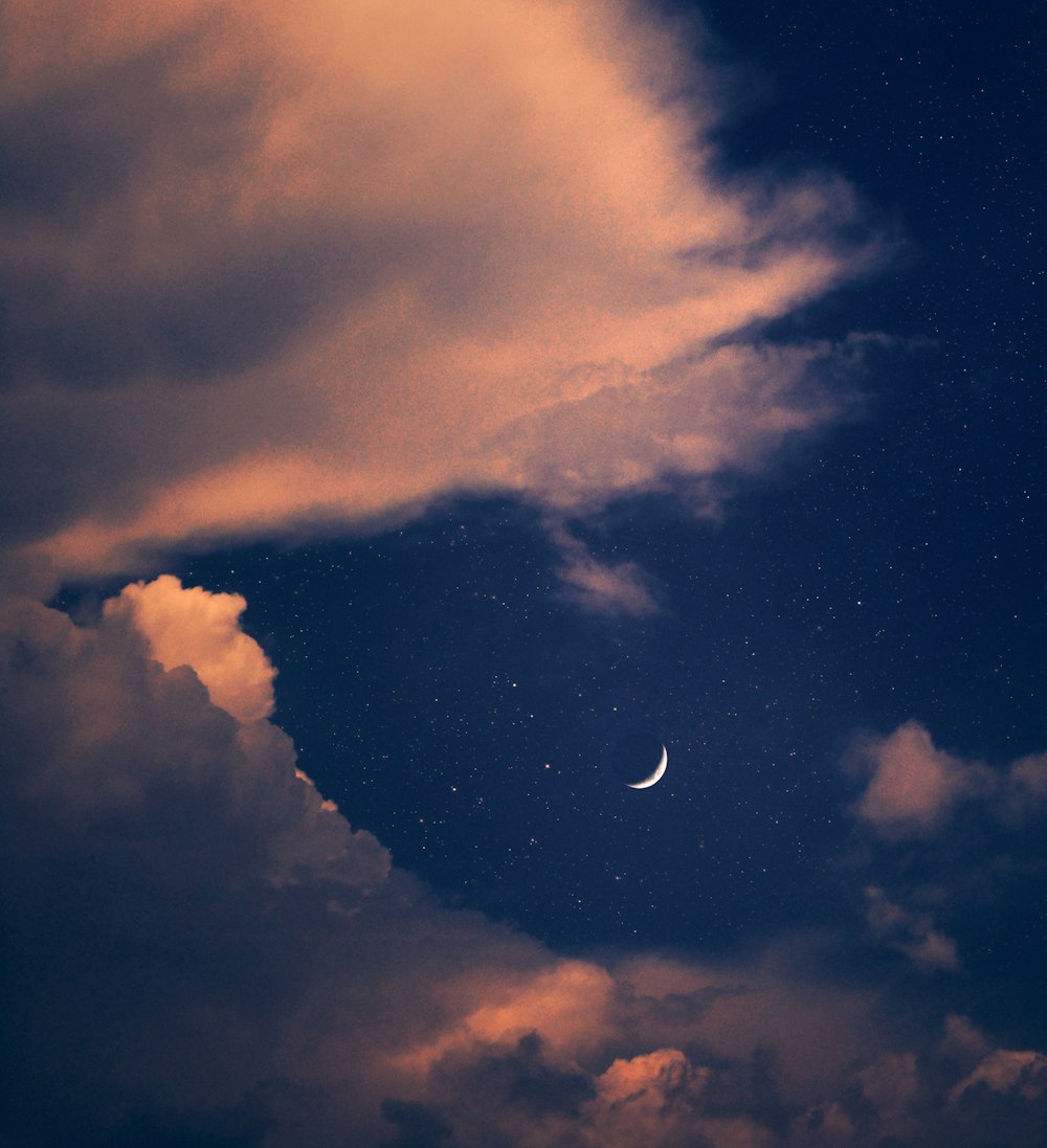 full moon covered by clouds