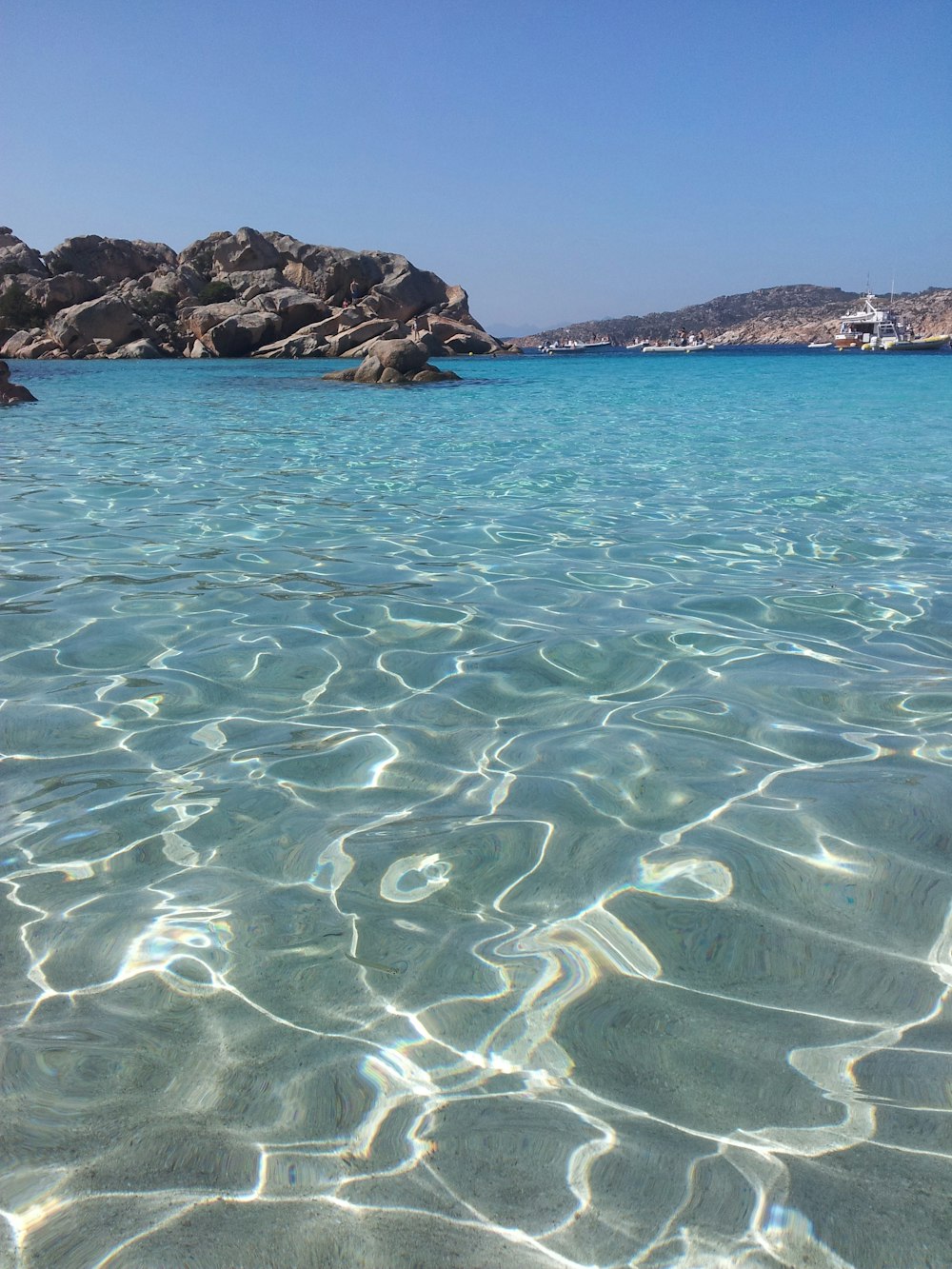 blue sea under blue sky during daytime