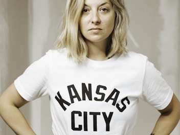 woman in white and black crew neck t-shirt
