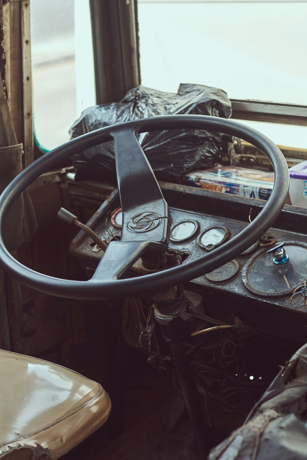 black steering wheel and car steering wheel