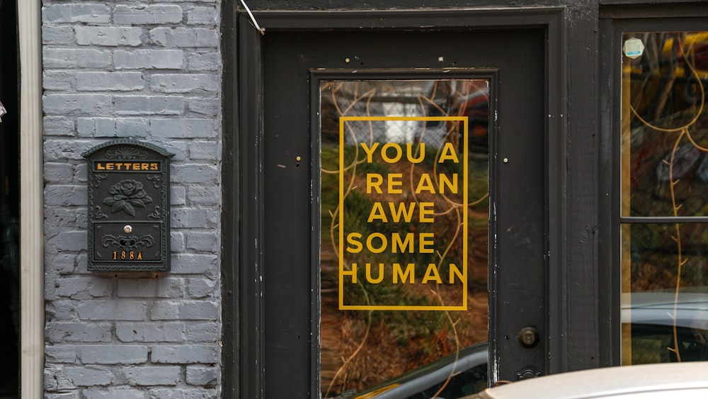 black wooden framed glass window