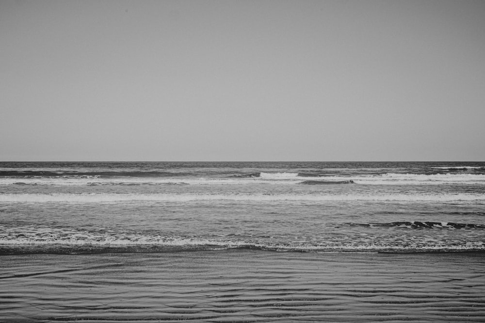 grayscale photo of sea waves