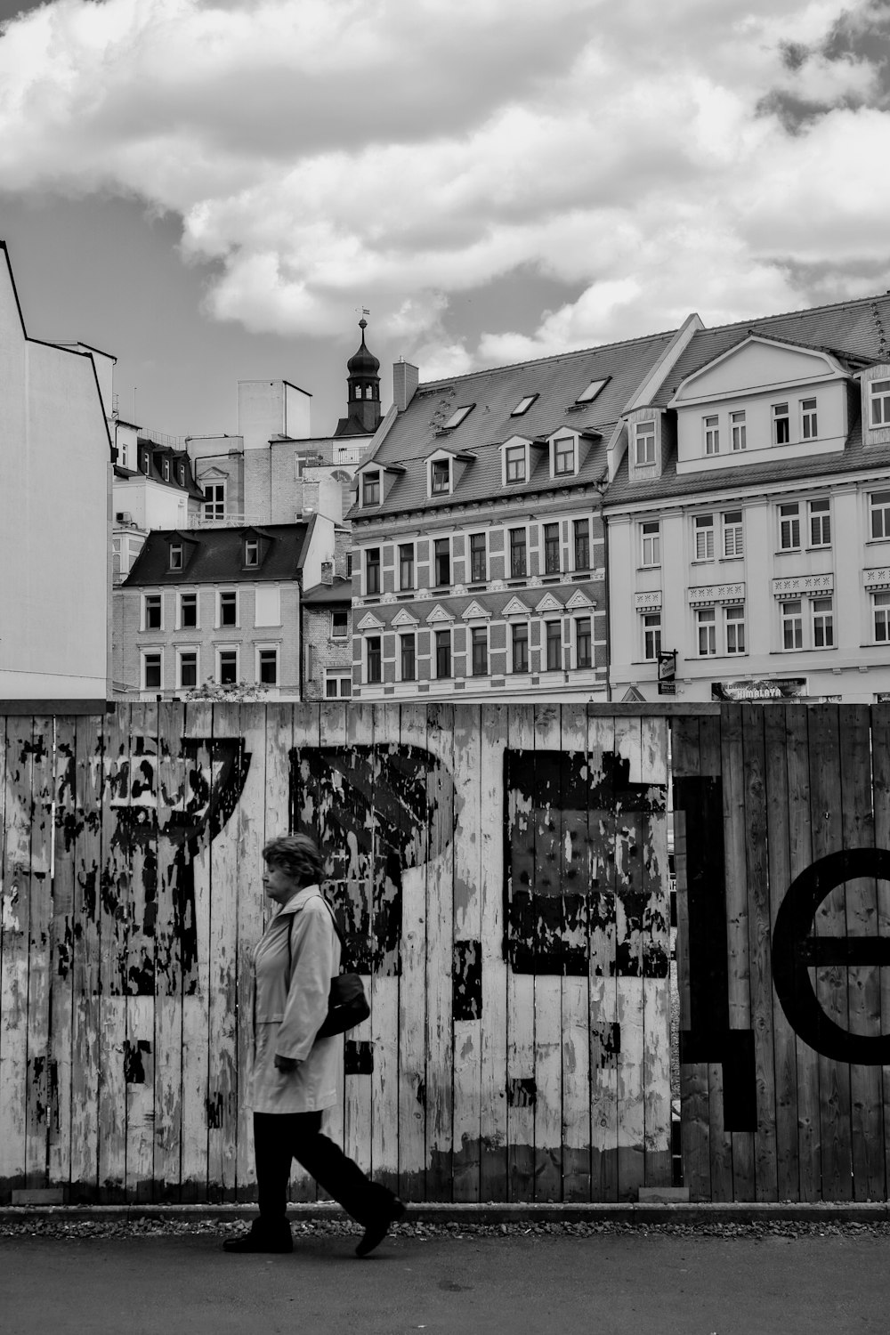 grayscale photo of people walking on street