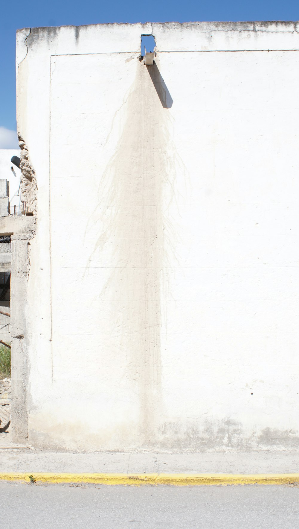 white concrete wall during daytime