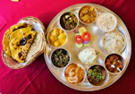 assorted foods on stainless steel tray