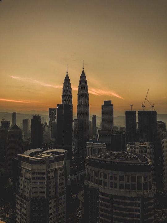 high rise buildings during sunset in KLCC Park Malaysia