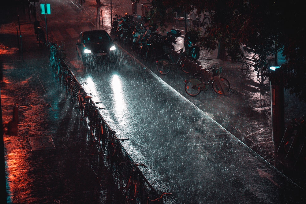 people riding bicycles on road during night time
