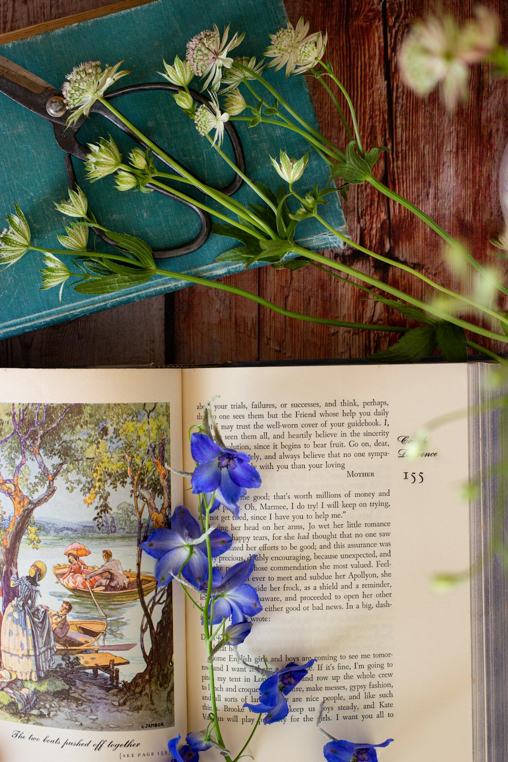 blue flowers on white book page