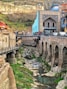 brown concrete bridge over river