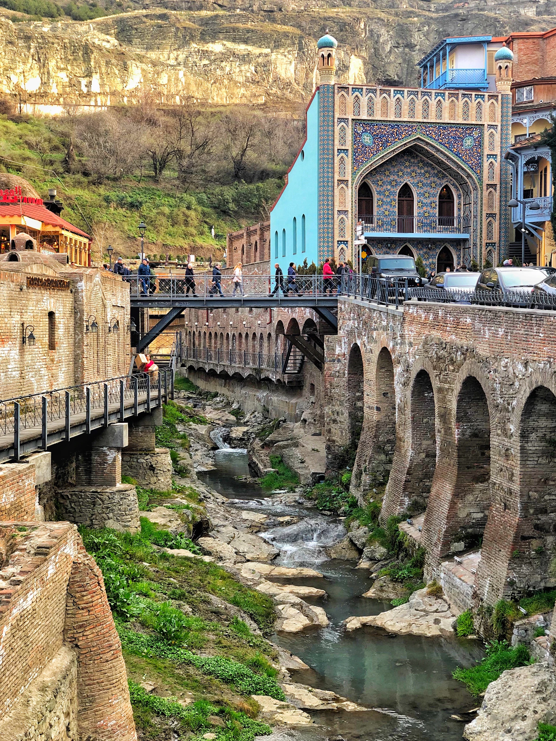 brown concrete bridge over river