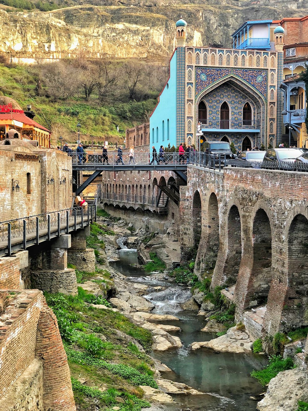 brown concrete bridge over river