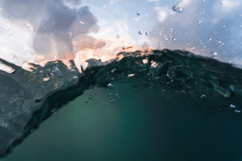 water splash on body of water