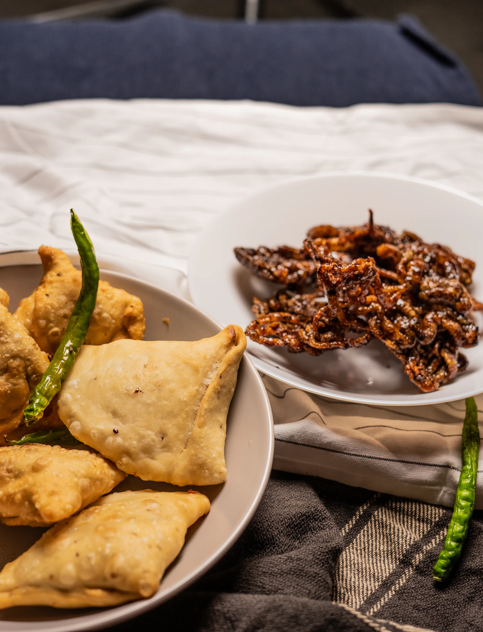 Balushahi served on a plate with syrup