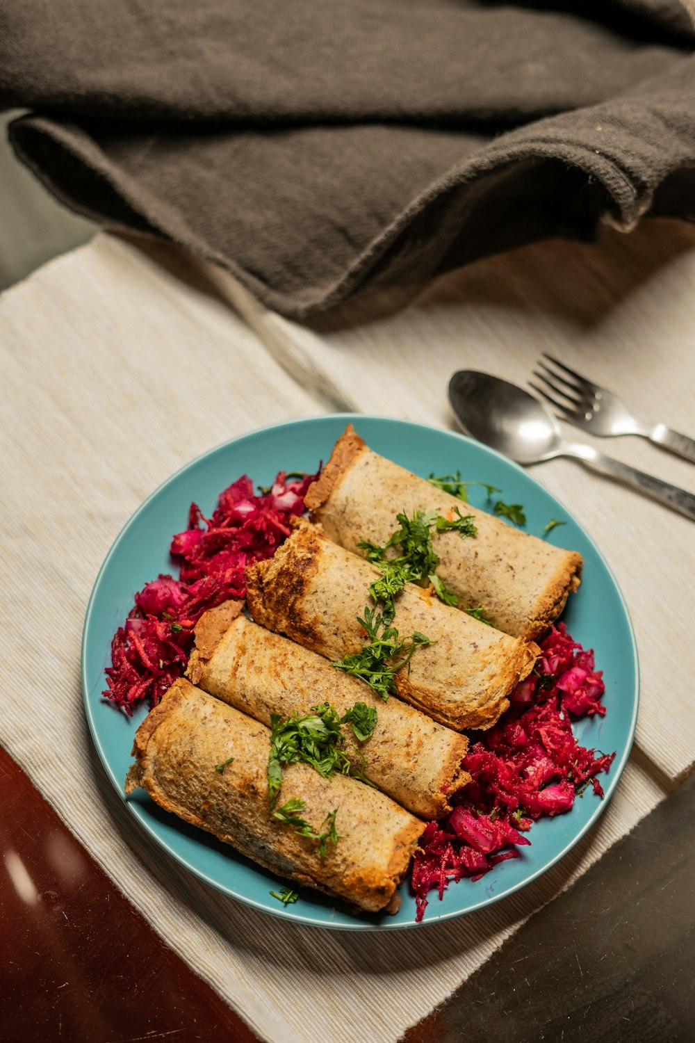 brown bread on pink ceramic plate