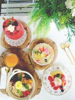 A beautifully arranged table with a variety of fresh juices and snacks.