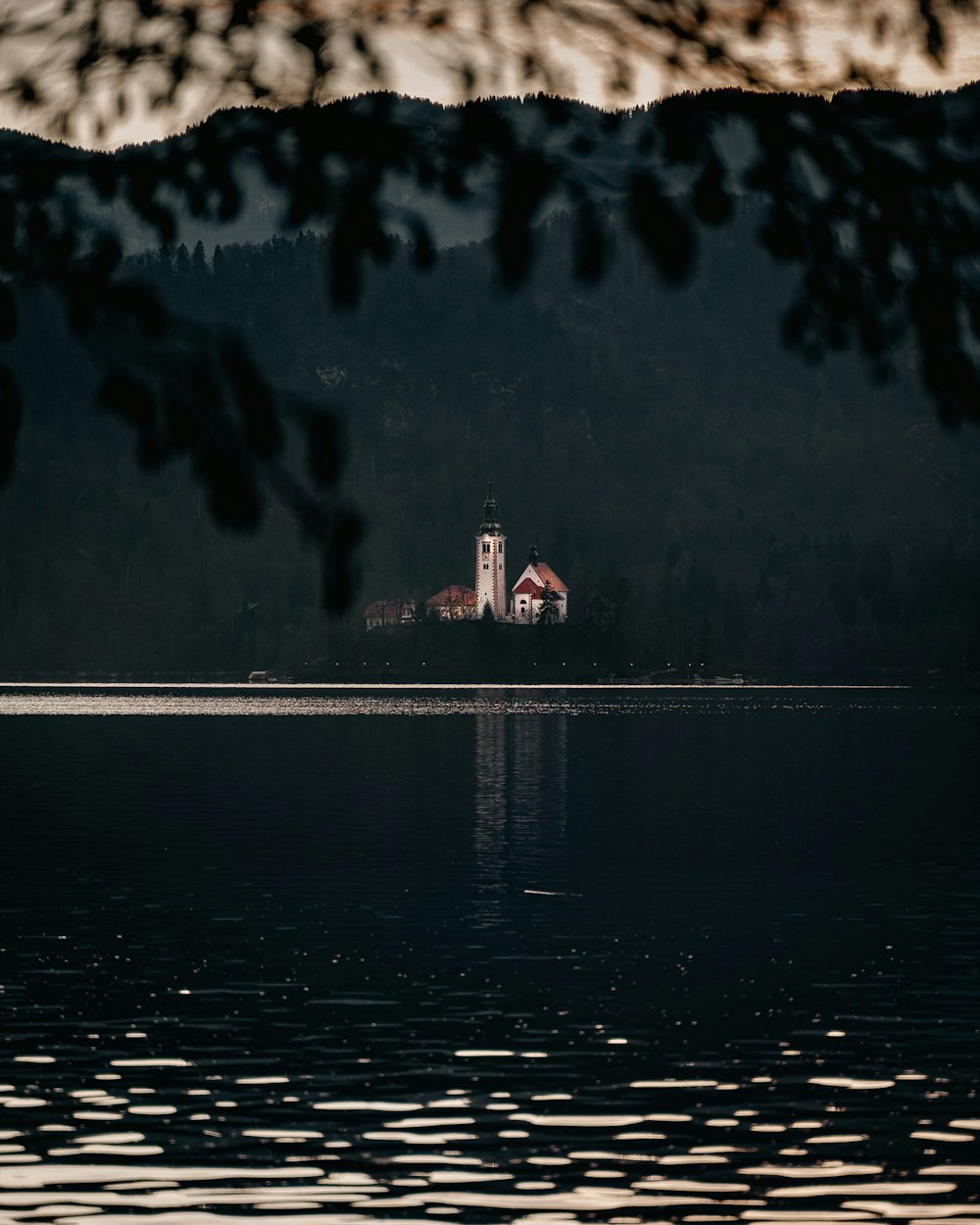 body of water near building during daytime