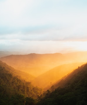 green mountains under white sky during daytime