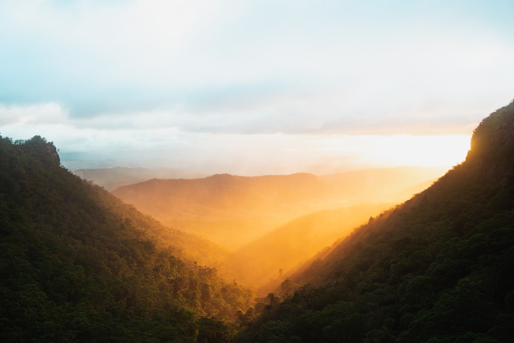 green mountains under white sky during daytime