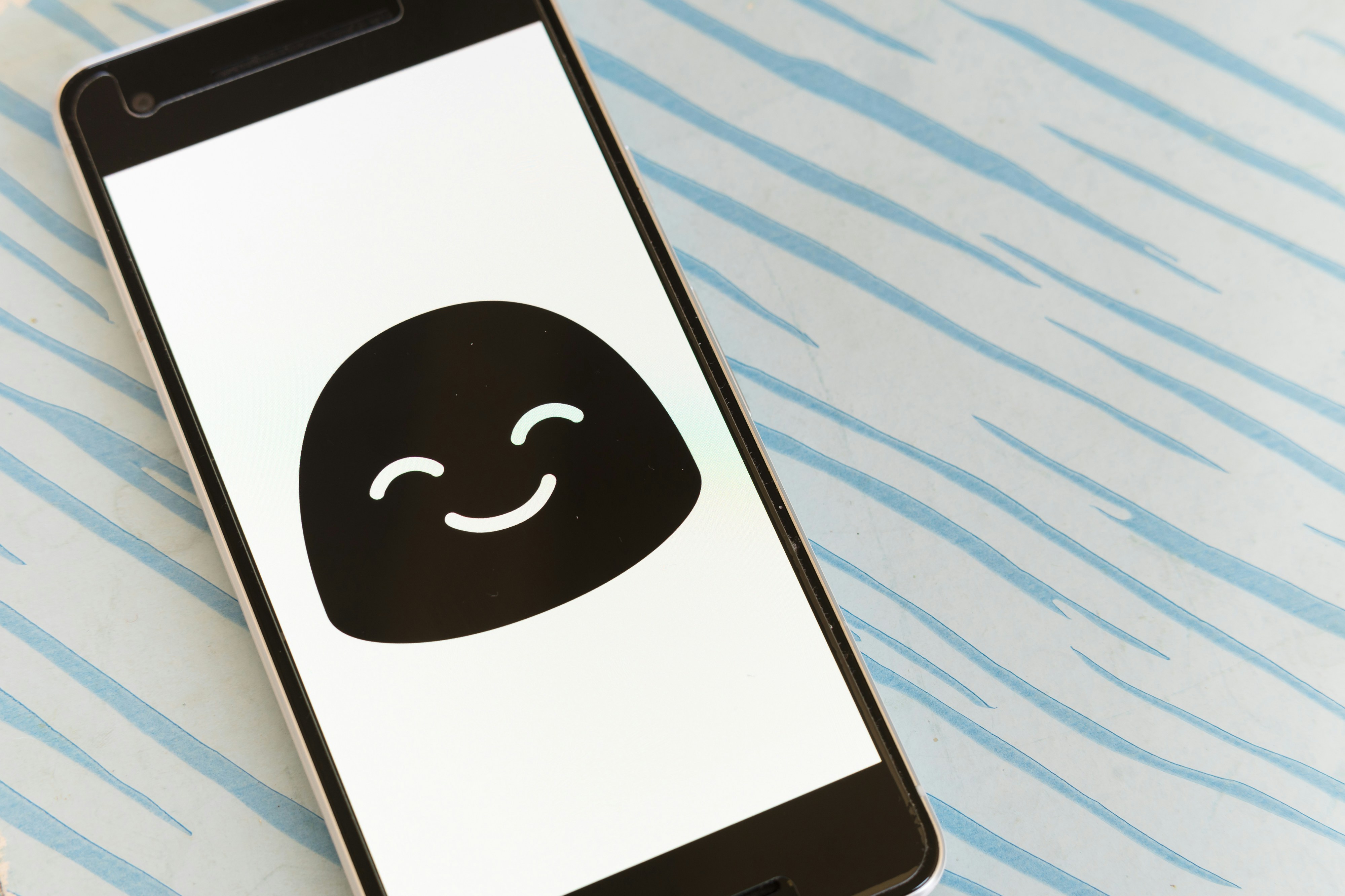 Smartphone showing a positive customer review notification