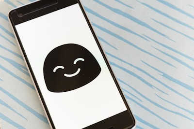 Close-up of a smartphone showing a positive customer review notification.